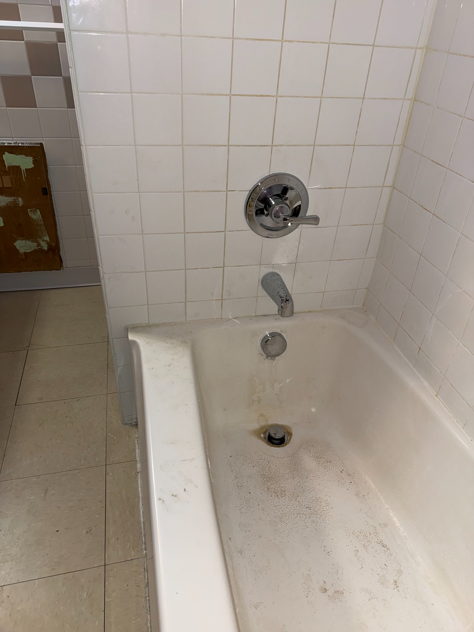 Bathtub with shower valve trim and tub spout installed by AHVEE