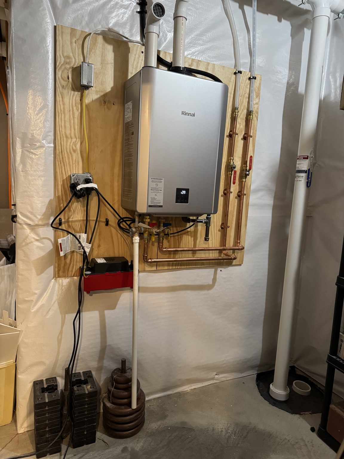 Rinnai tankless water heater with copper water piping installed by AHVEE